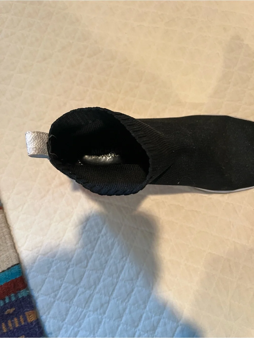 Michael Kors Black Slip-On Knit Sneakers with White and Red Accents